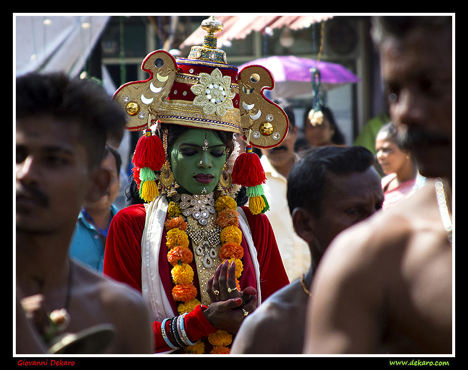 Green face goddess in an Hindu Parade, Kerala, India
