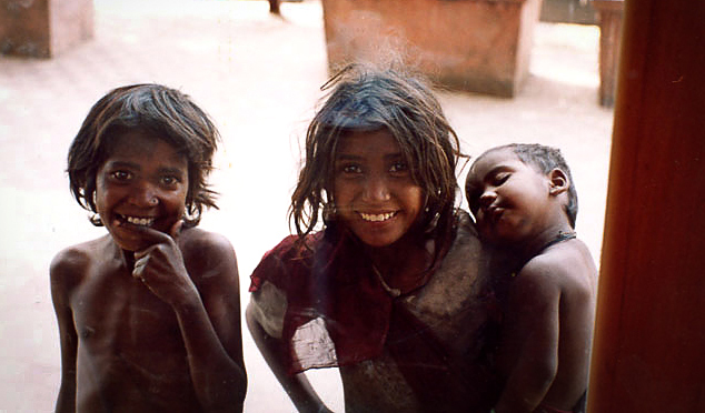 Children behind a cafe window, Mumbay, India, 2004